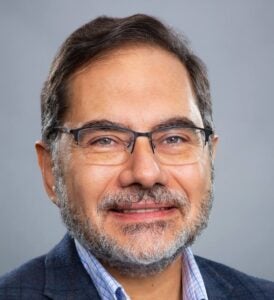 Headshot of Demos Economacos