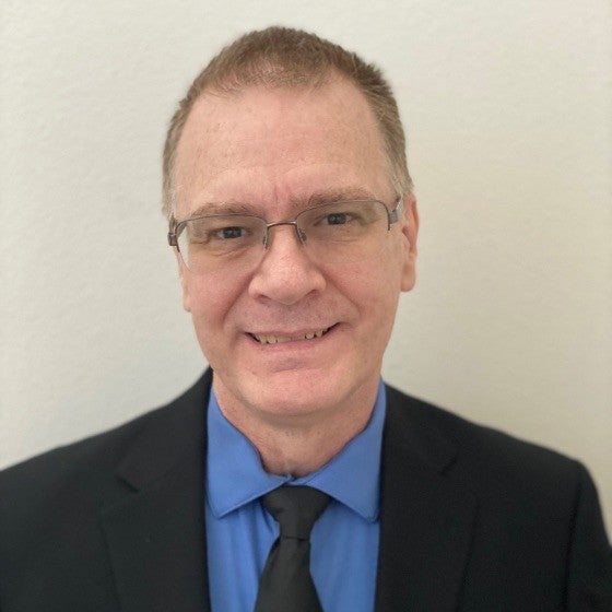 headshot of Bill Luton